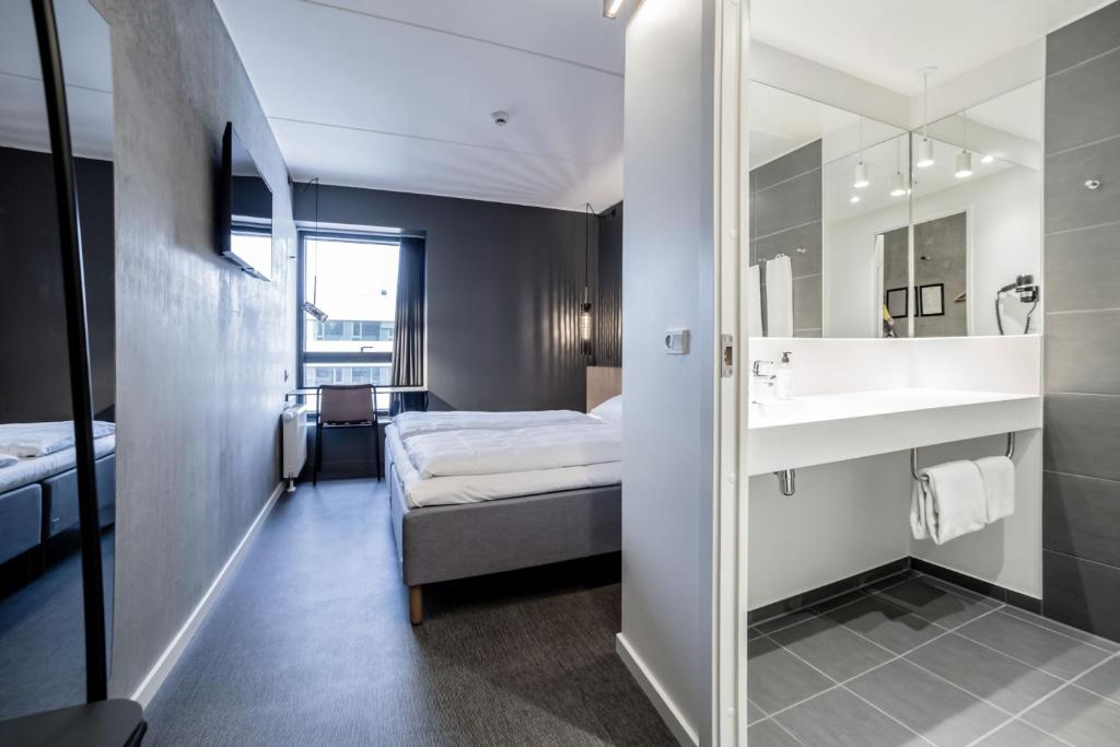 Uma cama ou camas num quarto em Four Points Flex by Sheraton Aalborg