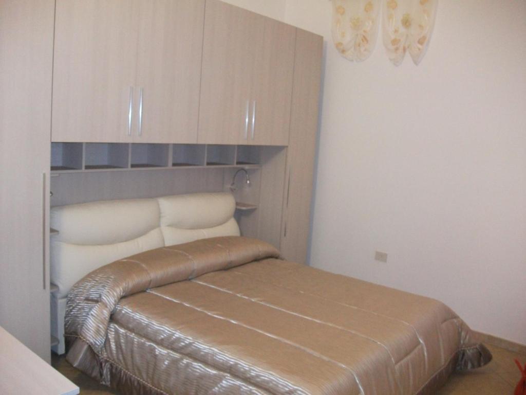 Katil atau katil-katil dalam bilik di Casa Vacanze Il Quadrifoglio