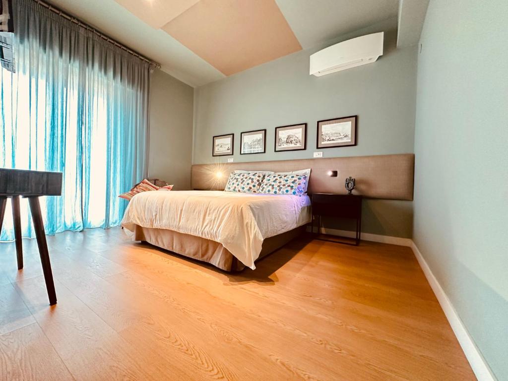 Ένα ή περισσότερα κρεβάτια σε δωμάτιο στο B&B Donna Ca'