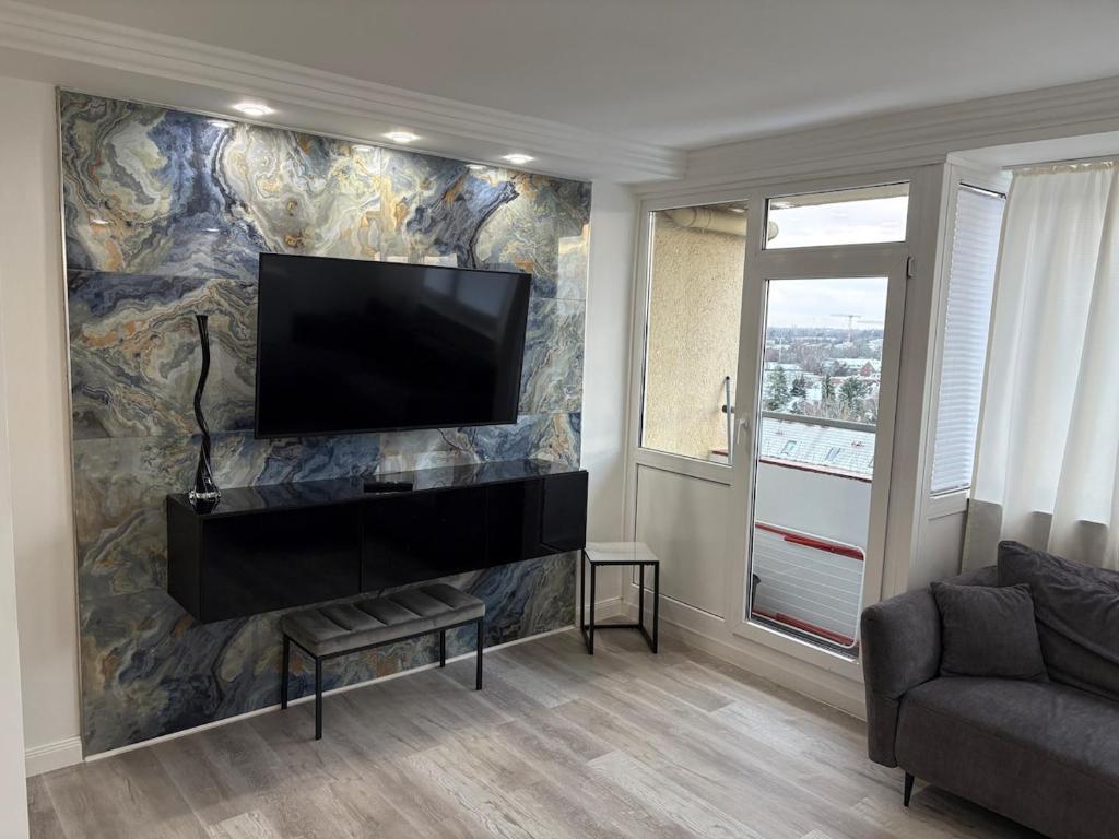 Μια τηλεόραση ή/και κέντρο ψυχαγωγίας στο Luxurious one-room apartment