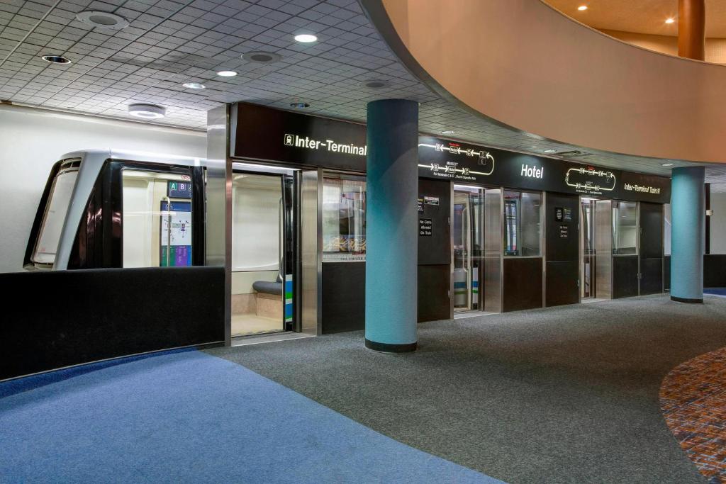 a mall with a bunch of doors in a building at Houston Airport Marriott at George Bush Intercontinental in Houston