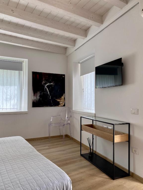 Telewizja i/lub zestaw kina domowego w obiekcie Bed and Breakfast Casa del Nonno