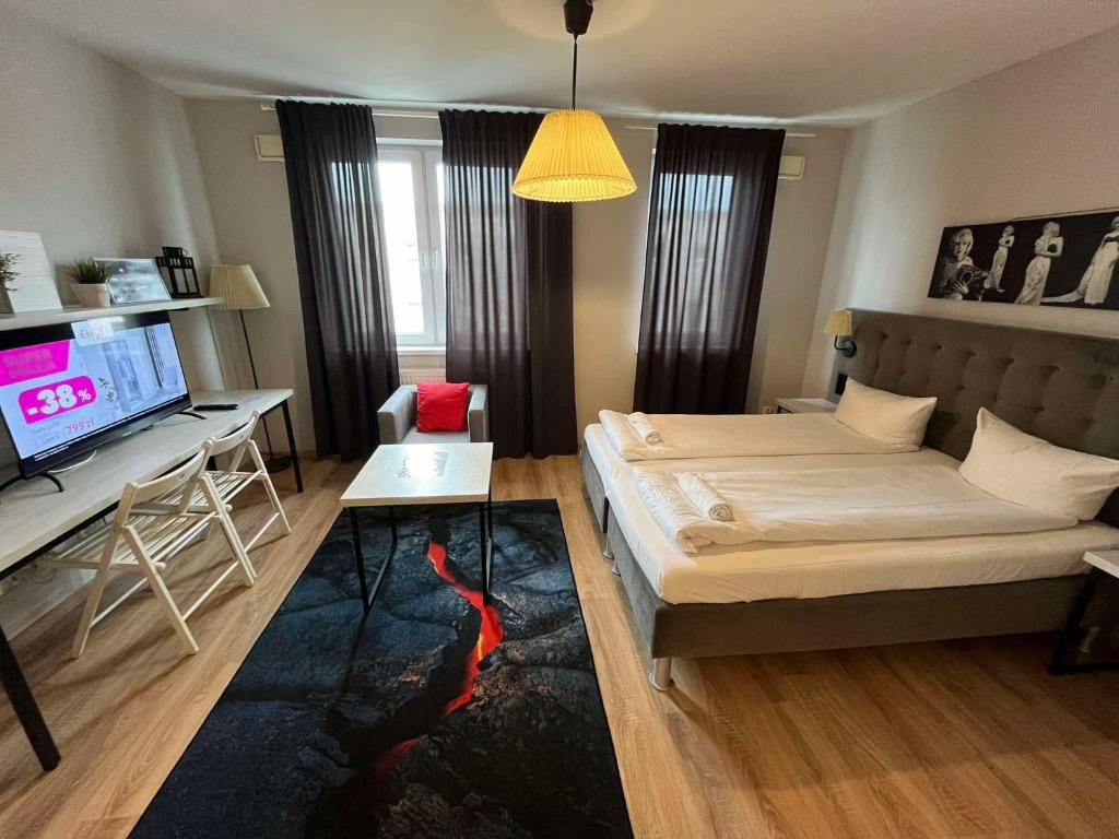 Postel nebo postele na pokoji v ubytování Residence Aparthotel