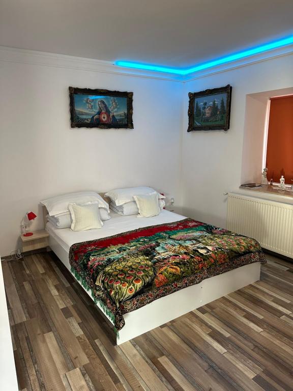 Postel nebo postele na pokoji v ubytování Casa Cezara