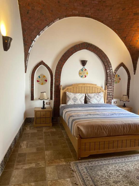 Postel nebo postele na pokoji v ubytování Villa Kemet