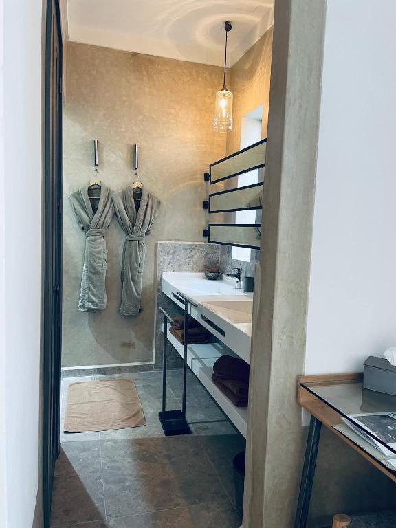 Postel nebo postele na pokoji v ubytování Riad Dar 73