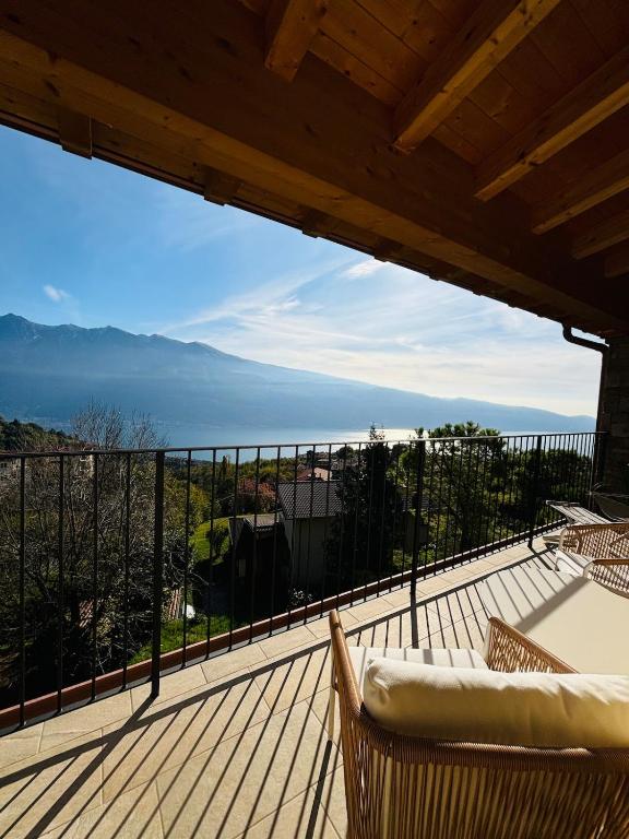 a balcony with a view of the ocean at Apartment Monti e Lago - Tignale in Tignale