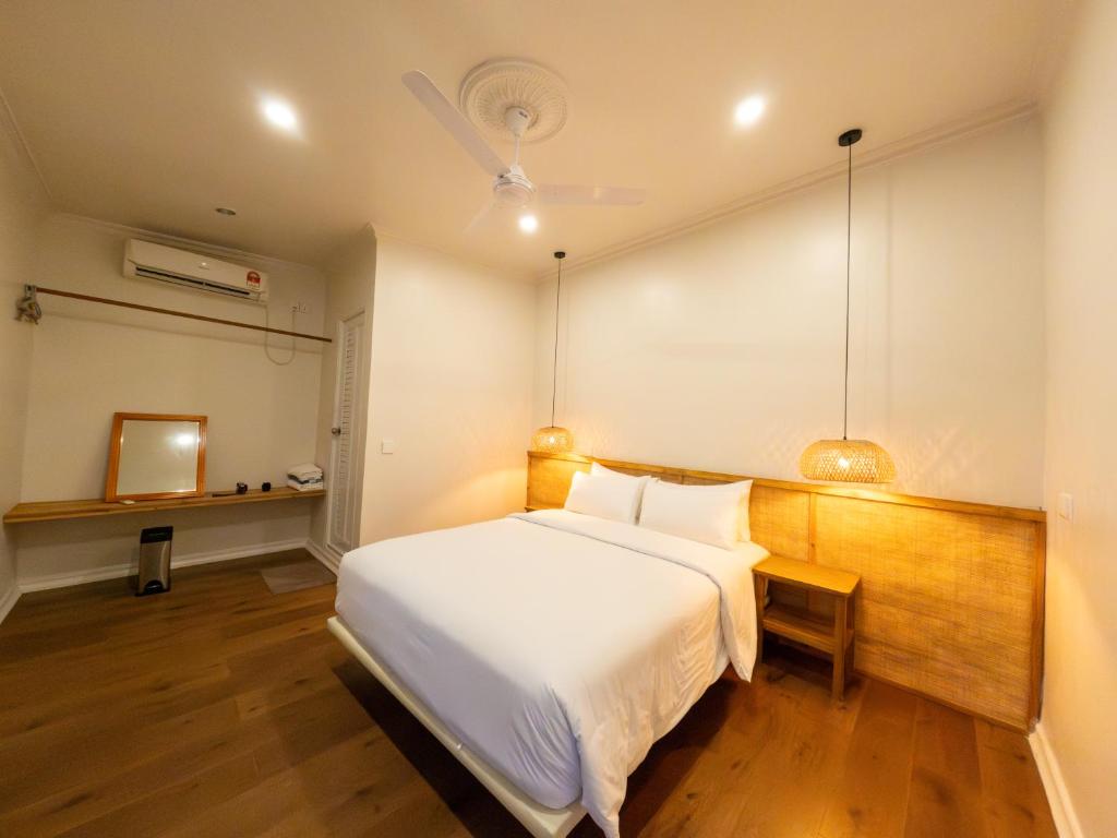 Postel nebo postele na pokoji v ubytování Noorani Retreat Dhiffushi