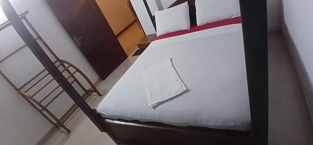 Postel nebo postele na pokoji v ubytování Oviniru Beach Hotel