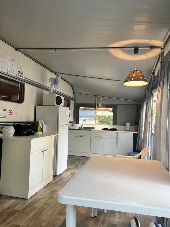 Kuchyň nebo kuchyňský kout v ubytování Caravan Cavallino - Valentini in Campeggio Union Lido