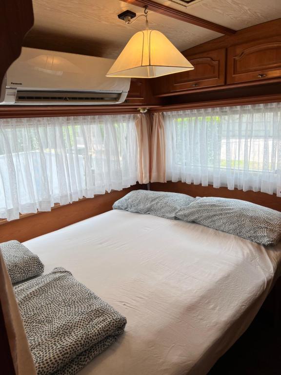 Postel nebo postele na pokoji v ubytování Caravan Cavallino - Valentini in Campeggio Union Lido