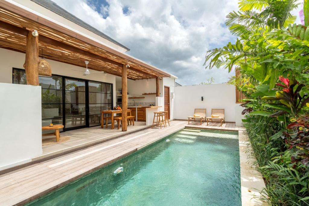 an image of a swimming pool in a villa at Villa Camille - Private 1BR Oasis with Pool in Nyanyi Beach in Tanah Lot