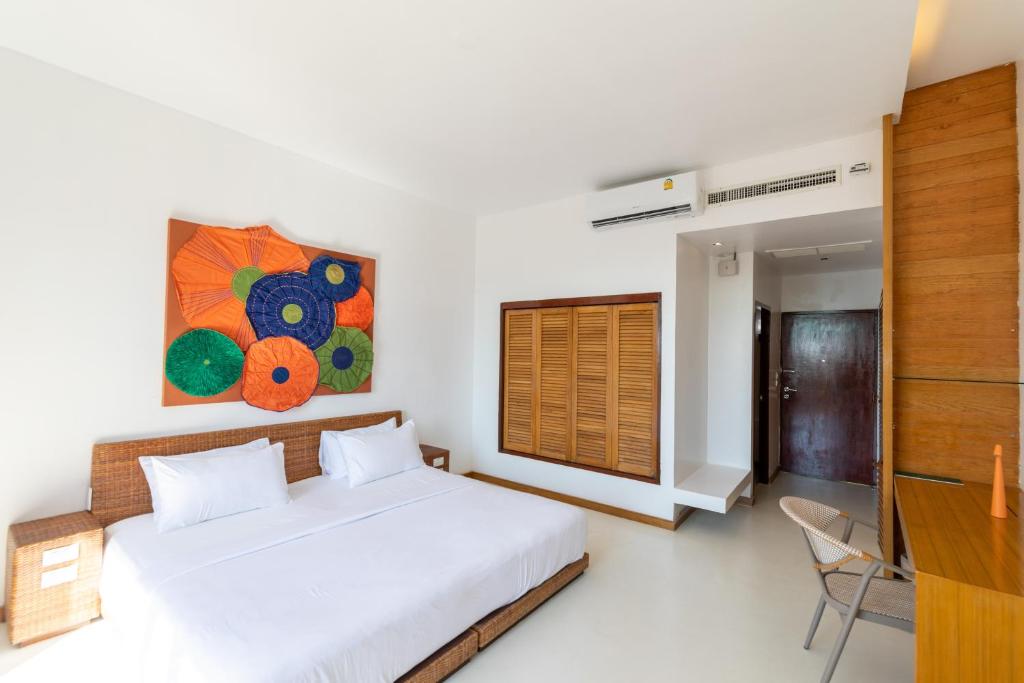 Postel nebo postele na pokoji v ubytování Ajinta Resort