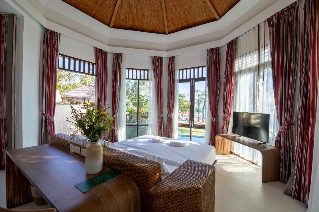 TV a/nebo společenská místnost v ubytování Ajinta Resort
