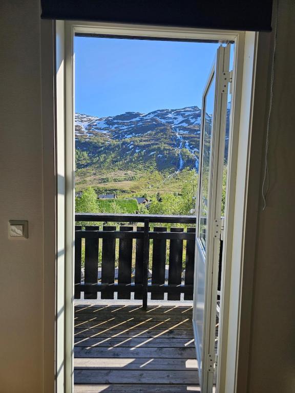 an open door to a balcony with a view at Mountain view 2 in Håra