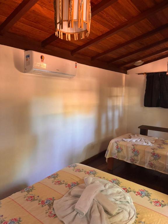 Postel nebo postele na pokoji v ubytování Pousada Arraial dos Sonhos