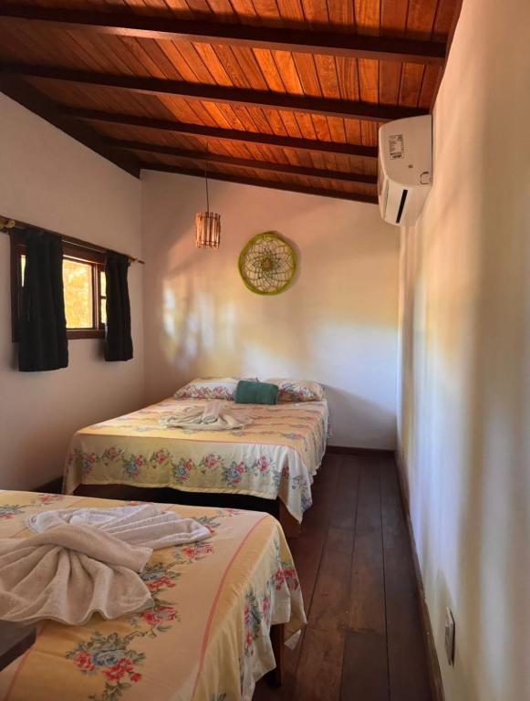 Postel nebo postele na pokoji v ubytování Pousada Arraial dos Sonhos