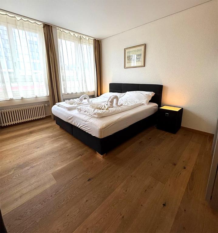 Voodi või voodid majutusasutuse Business Apartments Zentrum Grenchen toas
