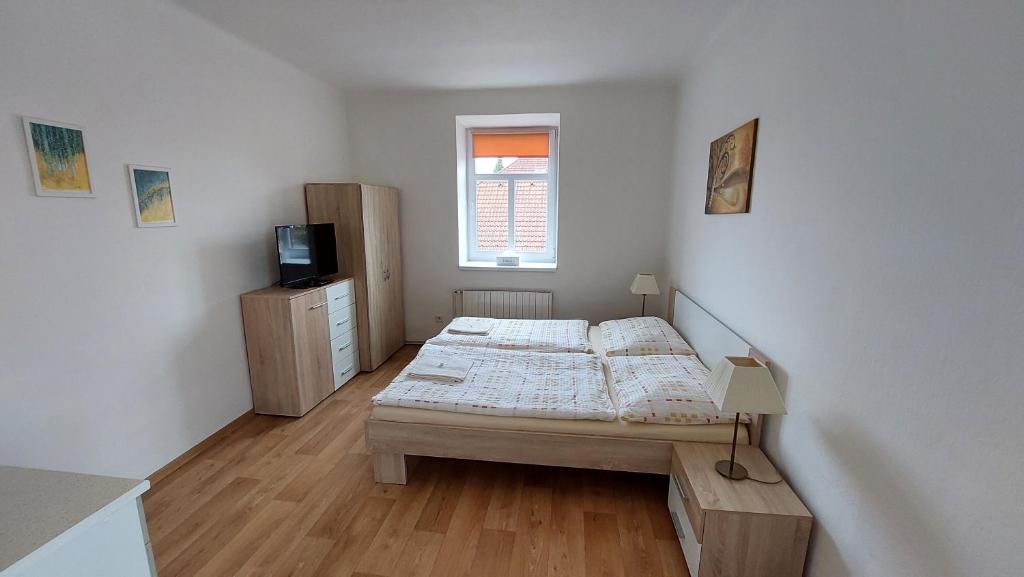 Postel nebo postele na pokoji v ubytování Hotýlek.eu