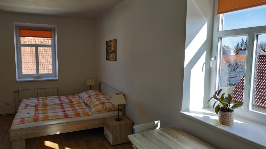 Postel nebo postele na pokoji v ubytování Hotýlek.eu