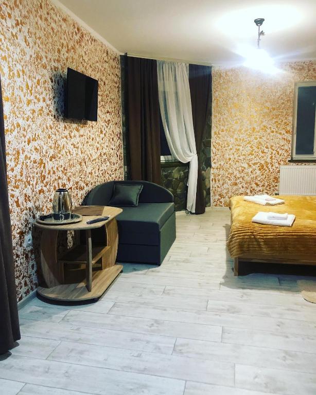 TV a/nebo společenská místnost v ubytování Good House Yaremche