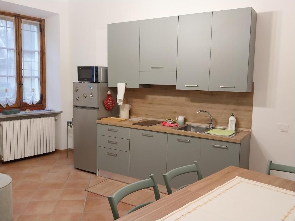 Kuchyň nebo kuchyňský kout v ubytování il salottino