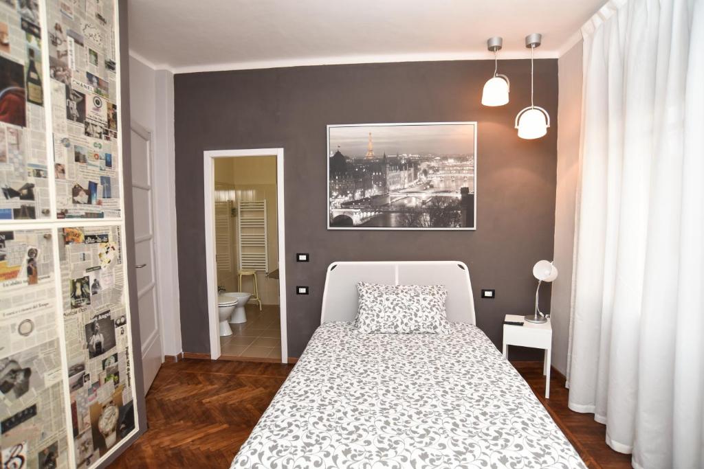 Letto o letti in una camera di L'Agrifoglio Affittacamere