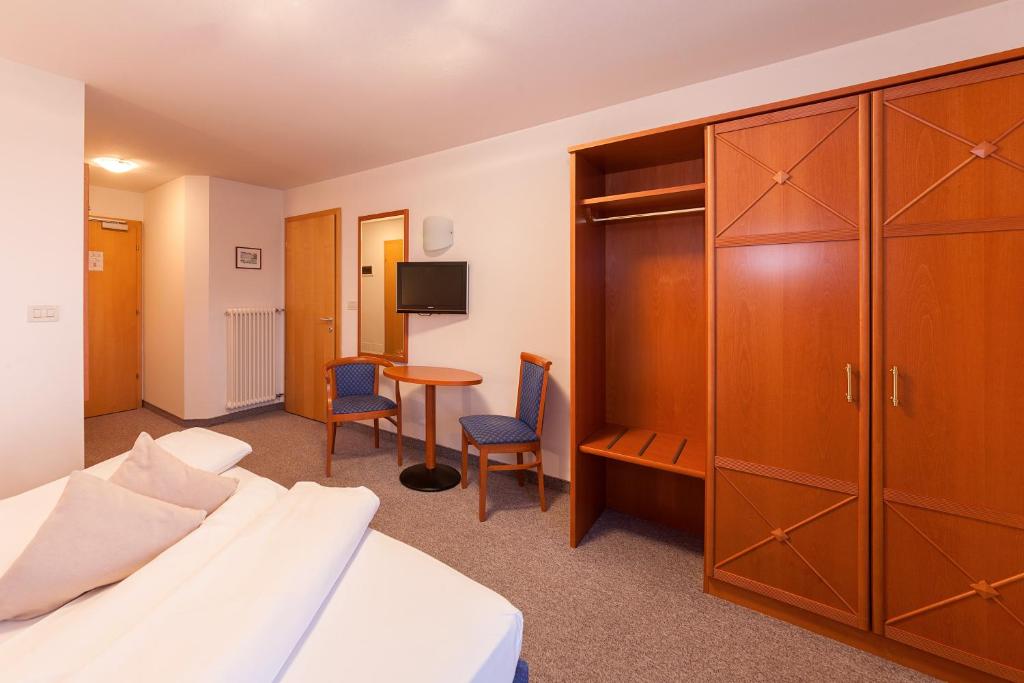 Postel nebo postele na pokoji v ubytování Hotel Tannerhof