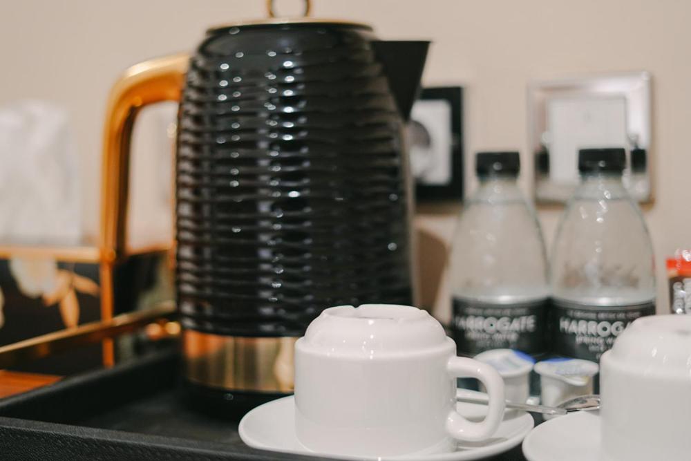 a black blender sitting on top of a counter at 40 Winks Hospitality in Durham