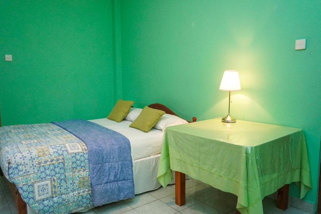 Postel nebo postele na pokoji v ubytování Bella Vista Ella