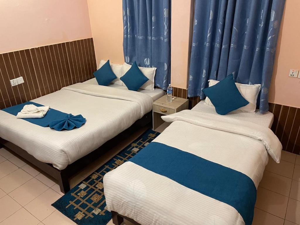 Rúm í herbergi á Hotel White Yak