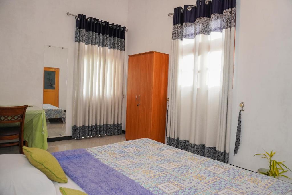 Postel nebo postele na pokoji v ubytování Bella Vista Ella