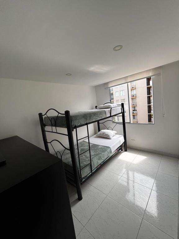 Postel nebo postele na pokoji v ubytování Apartamento de descanso Peñalisa Ricaurte