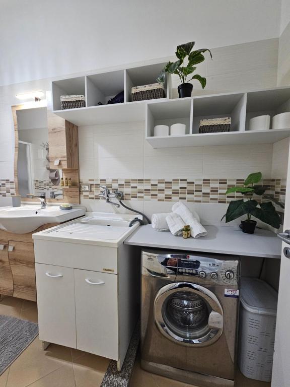 Kuchyň nebo kuchyňský kout v ubytování Stella-Guesthouse