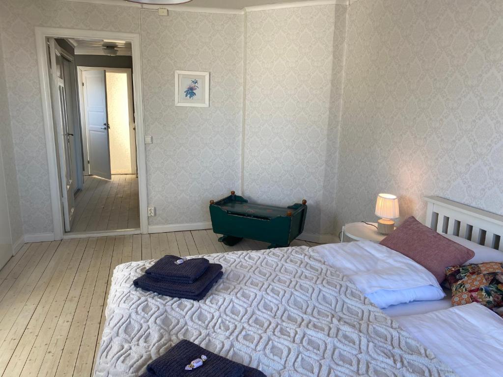 Postel nebo postele na pokoji v ubytování Hedvigs Restaurang