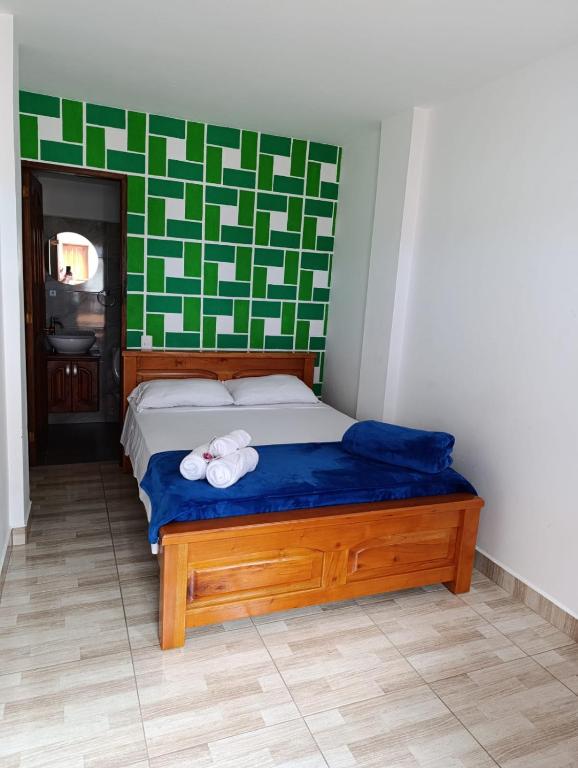 Postel nebo postele na pokoji v ubytování Hotel Macao
