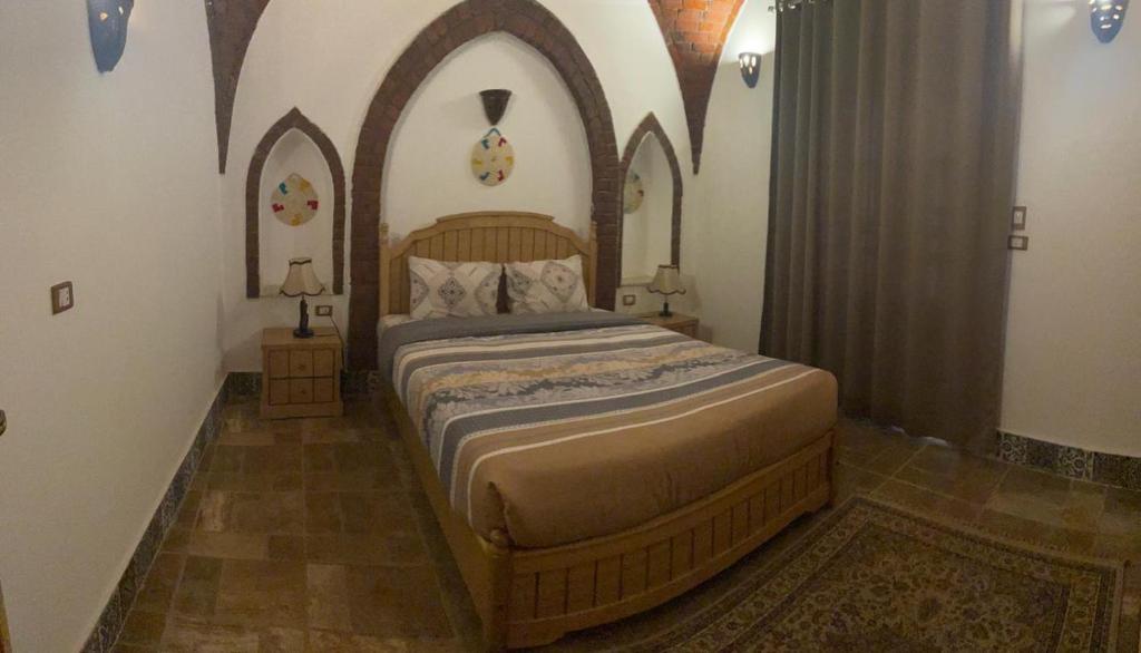 Postel nebo postele na pokoji v ubytování Villa Kemet