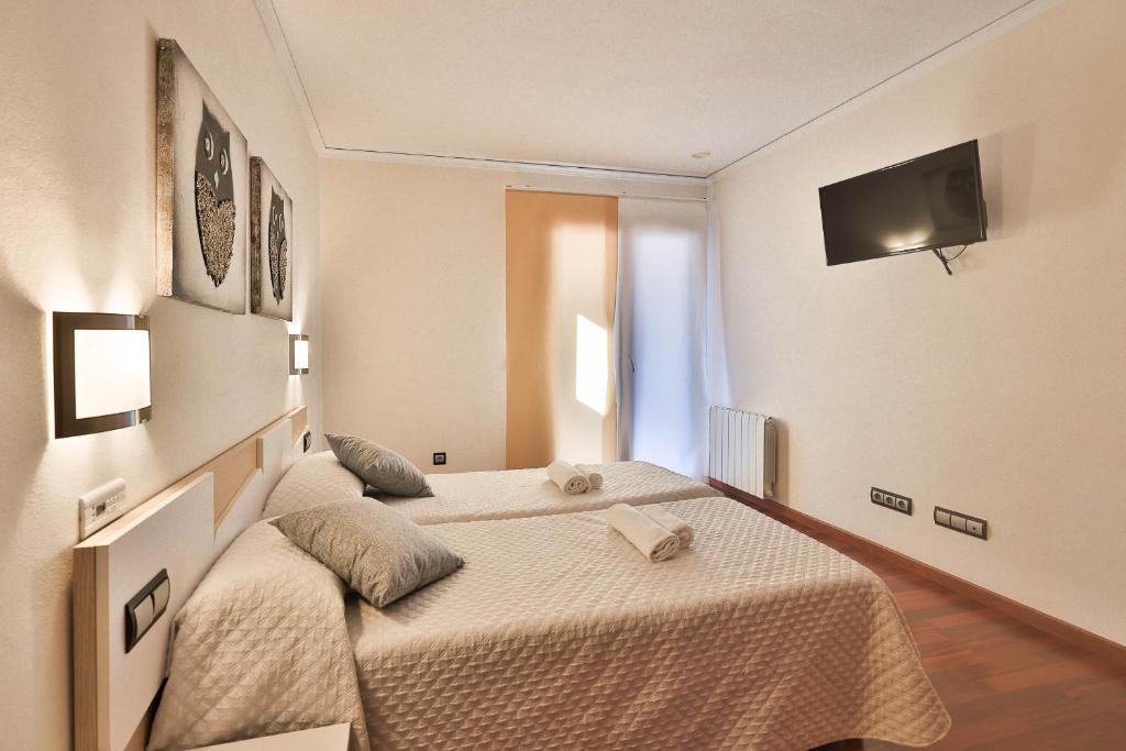 Postel nebo postele na pokoji v ubytování Casa Fenix