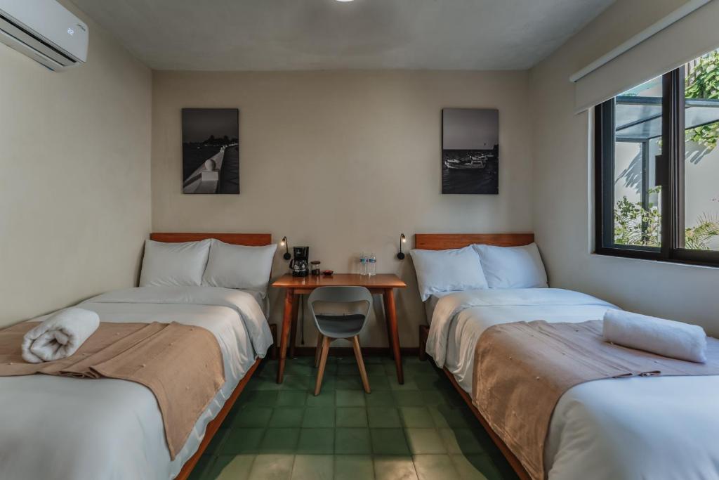 MUR MURA Boutique Guesthouse - Tweepersoonskamer Met 2 Aparte Bedden