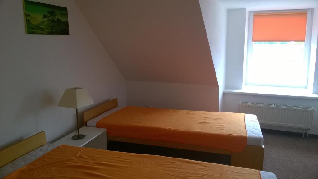 Postel nebo postele na pokoji v ubytování Hotýlek.eu