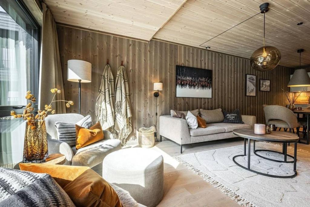 Χώρος καθιστικού στο Cozy ski in & out apartment