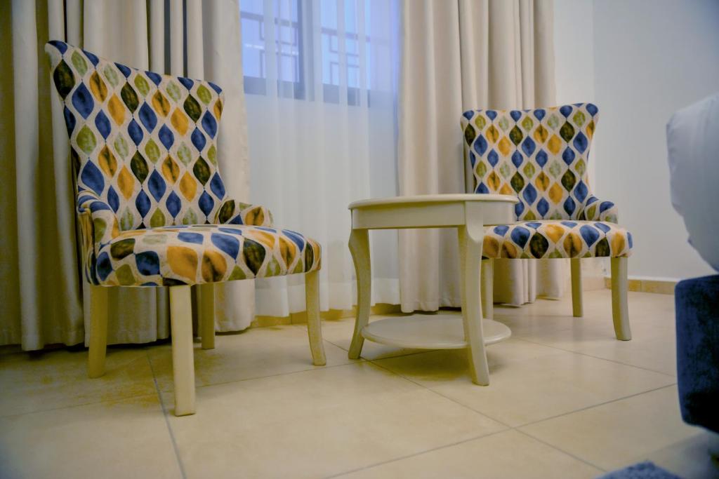 Posezení v ubytování Petra Karam Hotel