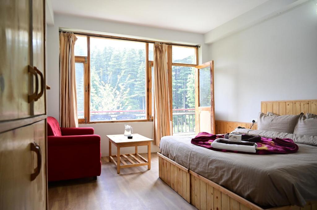 Postel nebo postele na pokoji v ubytování Rest N Ramble - Manali