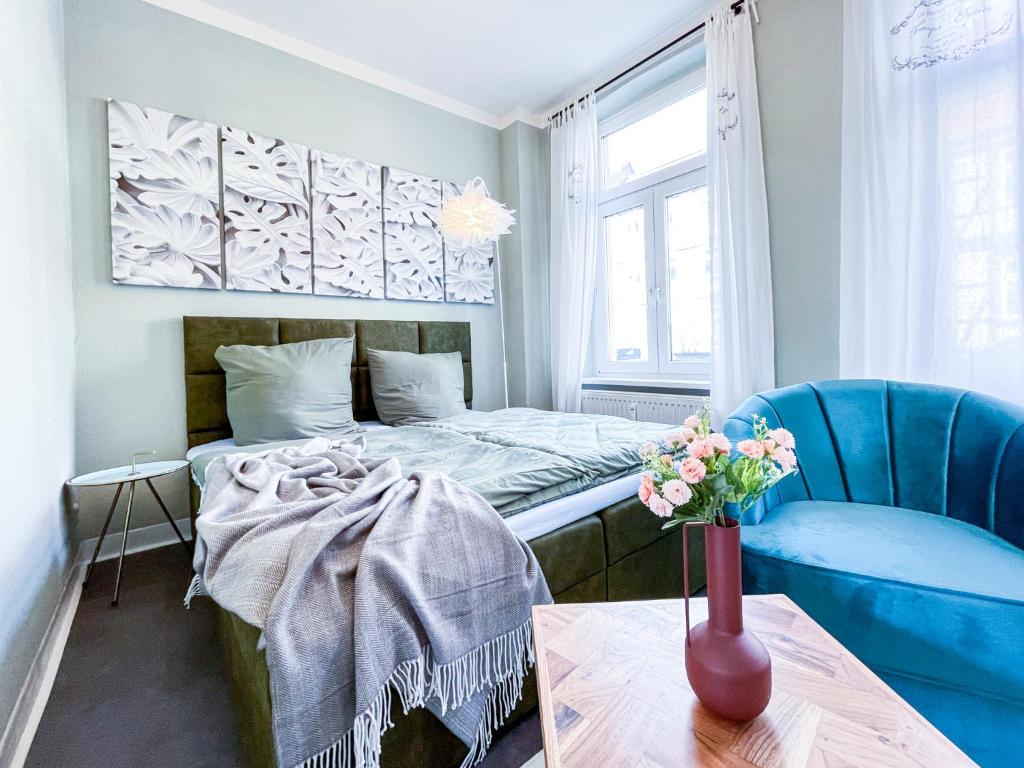 Ένα ή περισσότερα κρεβάτια σε δωμάτιο στο N&N Apartments - Stadt & Schlossblick mit eigenem Garten