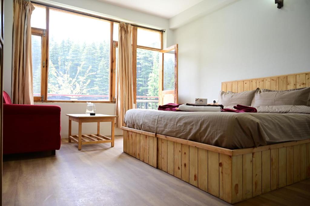 Postel nebo postele na pokoji v ubytování Rest N Ramble - Manali