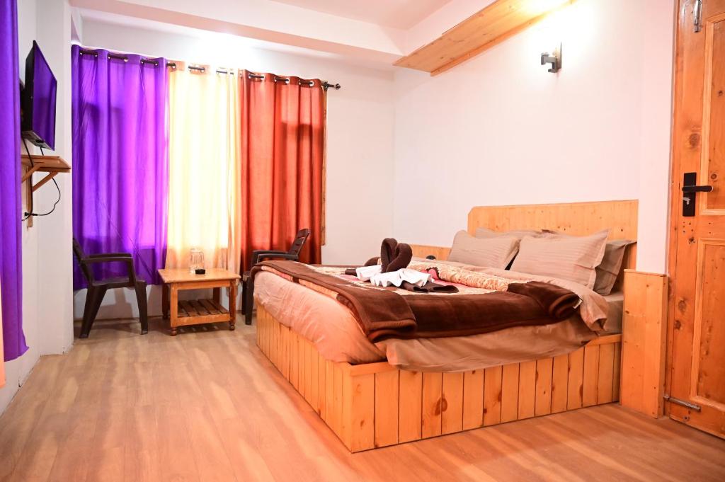 Postel nebo postele na pokoji v ubytování Rest N Ramble - Manali