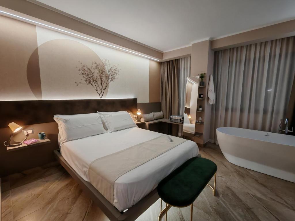 Postel nebo postele na pokoji v ubytování EFFE4 Lovely Room
