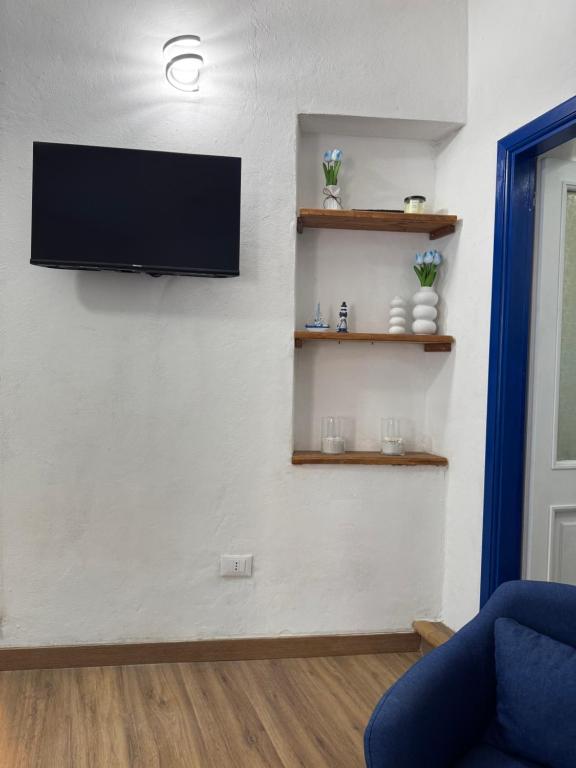 TV a/nebo společenská místnost v ubytování Framari