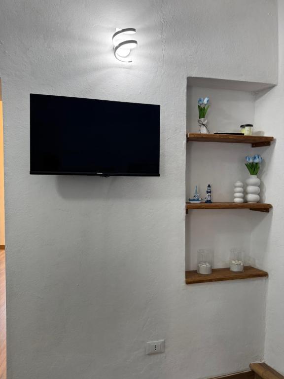 TV a/nebo společenská místnost v ubytování Framari