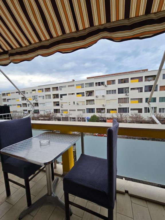Balkonas arba terasa apgyvendinimo įstaigoje Ideal Home
